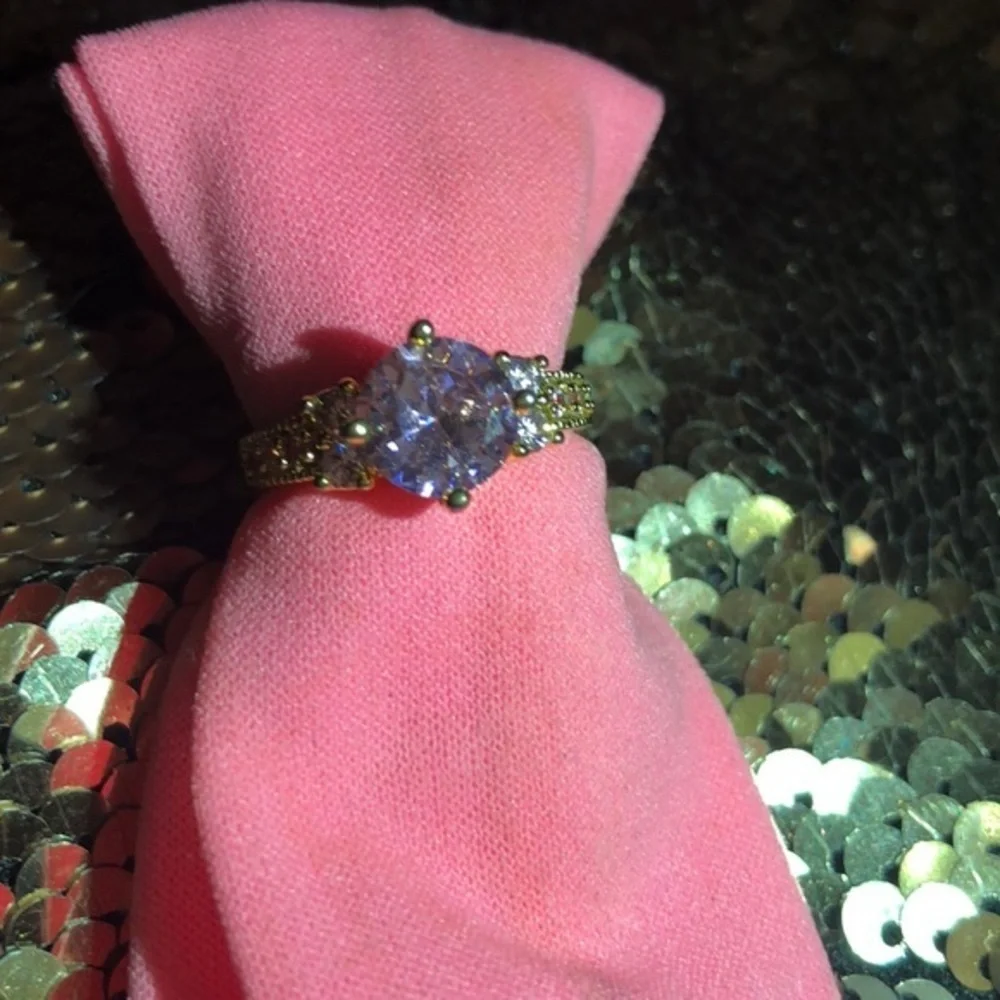 Woman’s Pink sapphire ring Gold Tone size 8